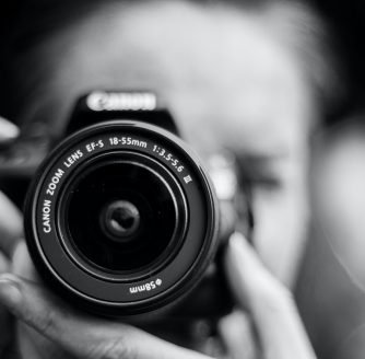 holding camera up to eye